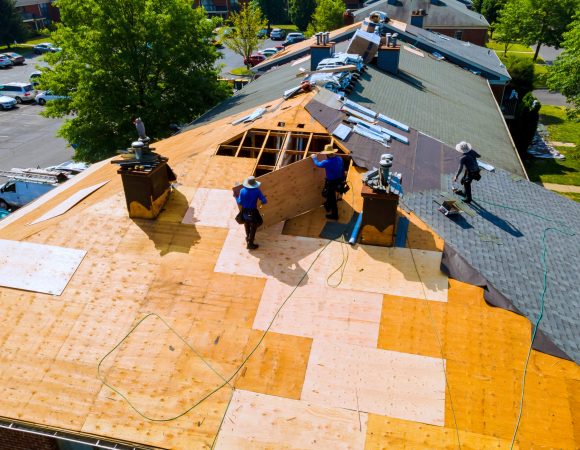 Replace old asphalt bitumen shingles on house roof in order to repair roof