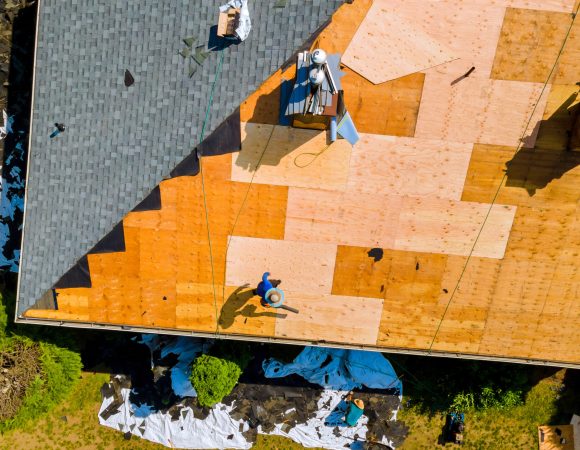 Roof repair by replacing old asphalt bitumen shingles